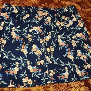 St. John's Bay mini skirt, built-in shorts size12, navy with flowers